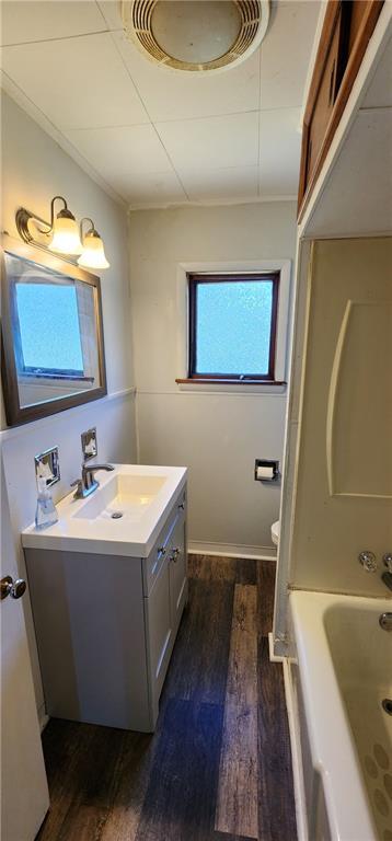 631 Reed Avenue Monessen, PA 15062 - Photo 9 of 14 a bathroom with a sink a mirror and a bathtub
