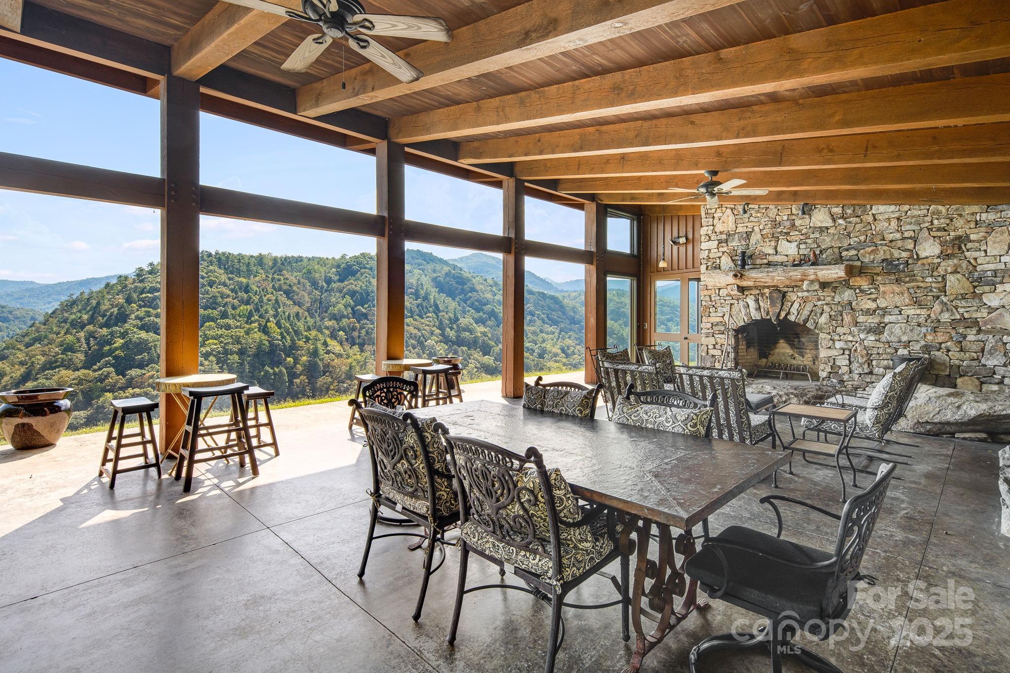 111 Wild Turkey Loop Marshall, NC 28753 - Photo 11 of 19 a view of a dining room with furniture window and outside view