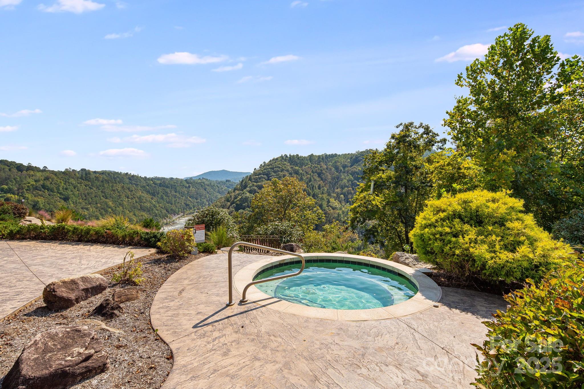 111 Wild Turkey Loop Marshall, NC 28753 - Photo 14 of 19 a view of a backyard with sitting area