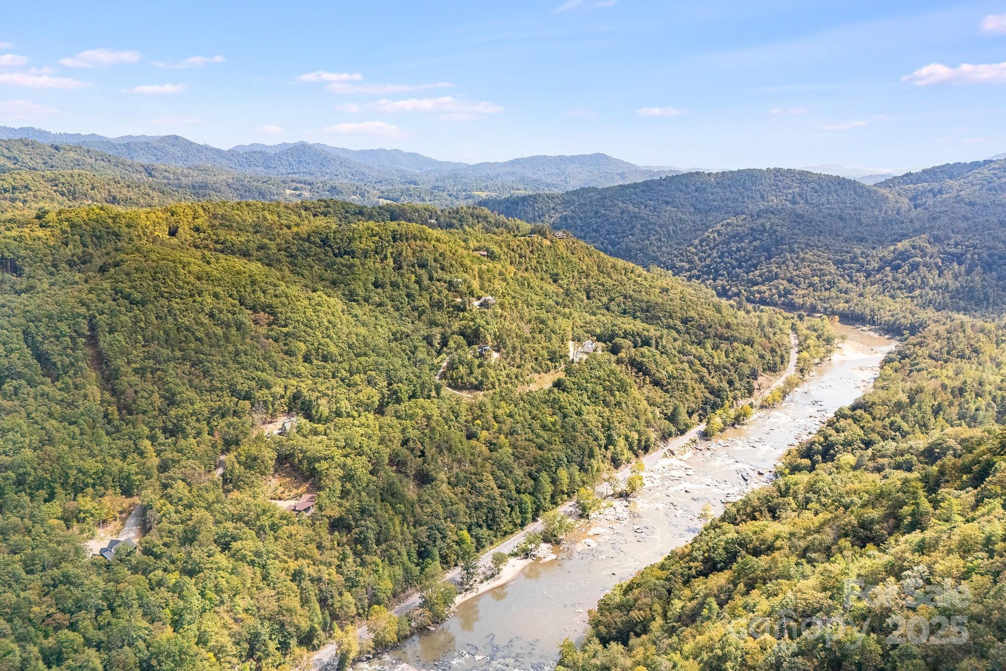 111 Wild Turkey Loop Marshall, NC 28753 - Photo 17 of 19 a view of a city with mountains in the background