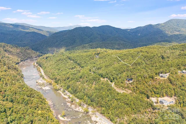 a view of a house with a mountain