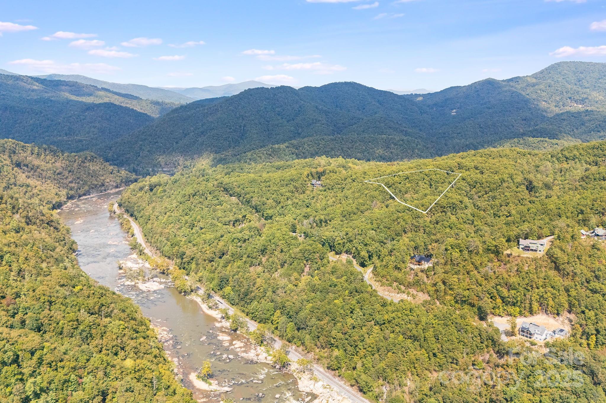 111 Wild Turkey Loop Marshall, NC 28753 - Photo 5 of 19 a view of a house with a mountain