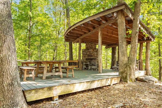 a view of swimming pool with outdoor seating