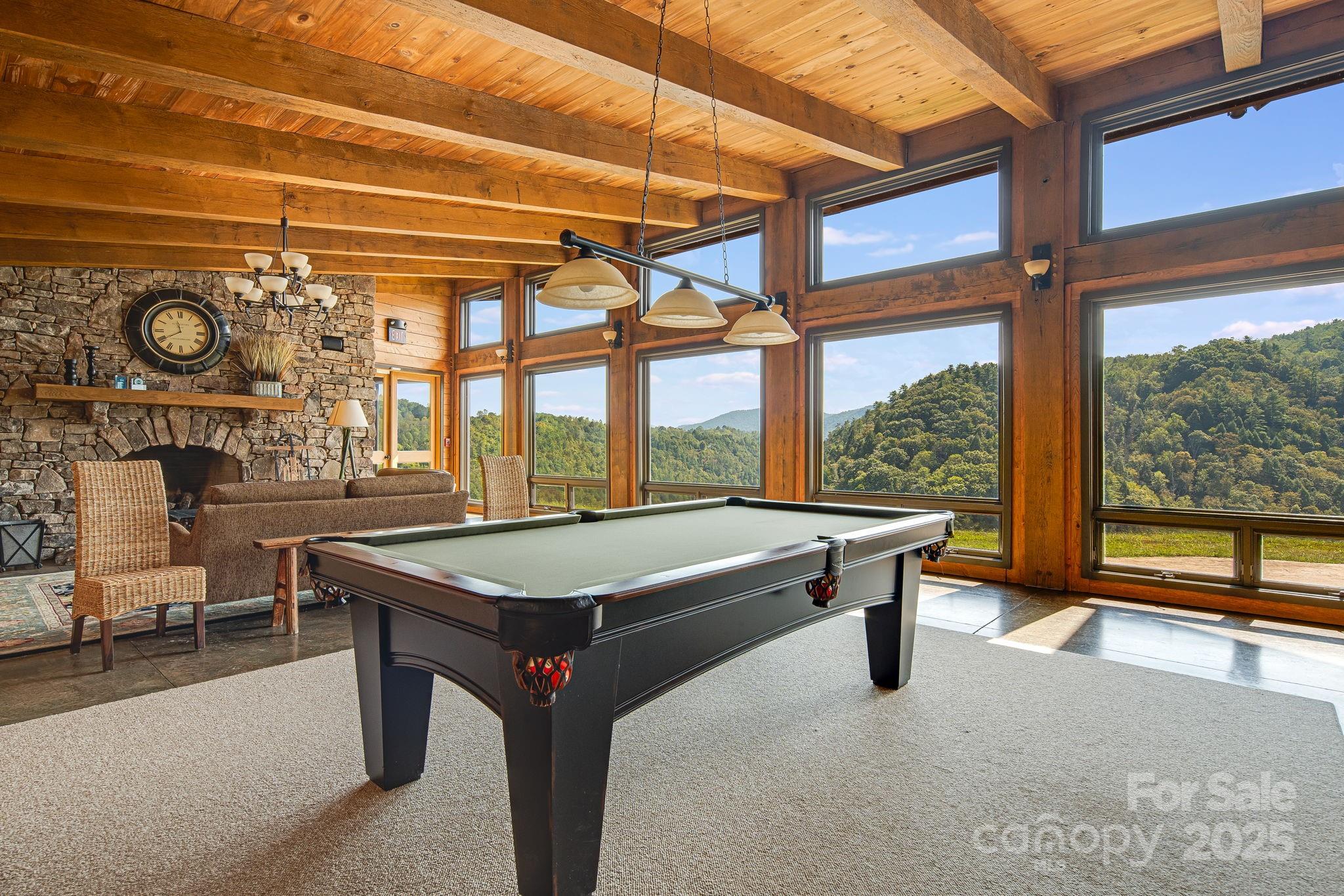 111 Wild Turkey Loop Marshall, NC 28753 - Photo 10 of 19 a room with pool table and windows