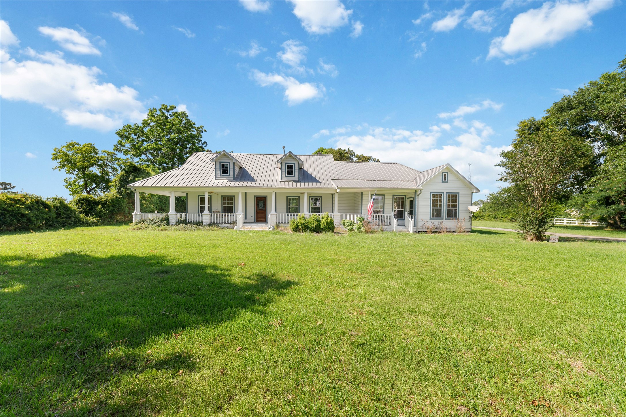 26631 Decker Prairie-Rosehill Road Magnolia, TX 77355 - Photo 5 of 20 a front view of house with yard and green space