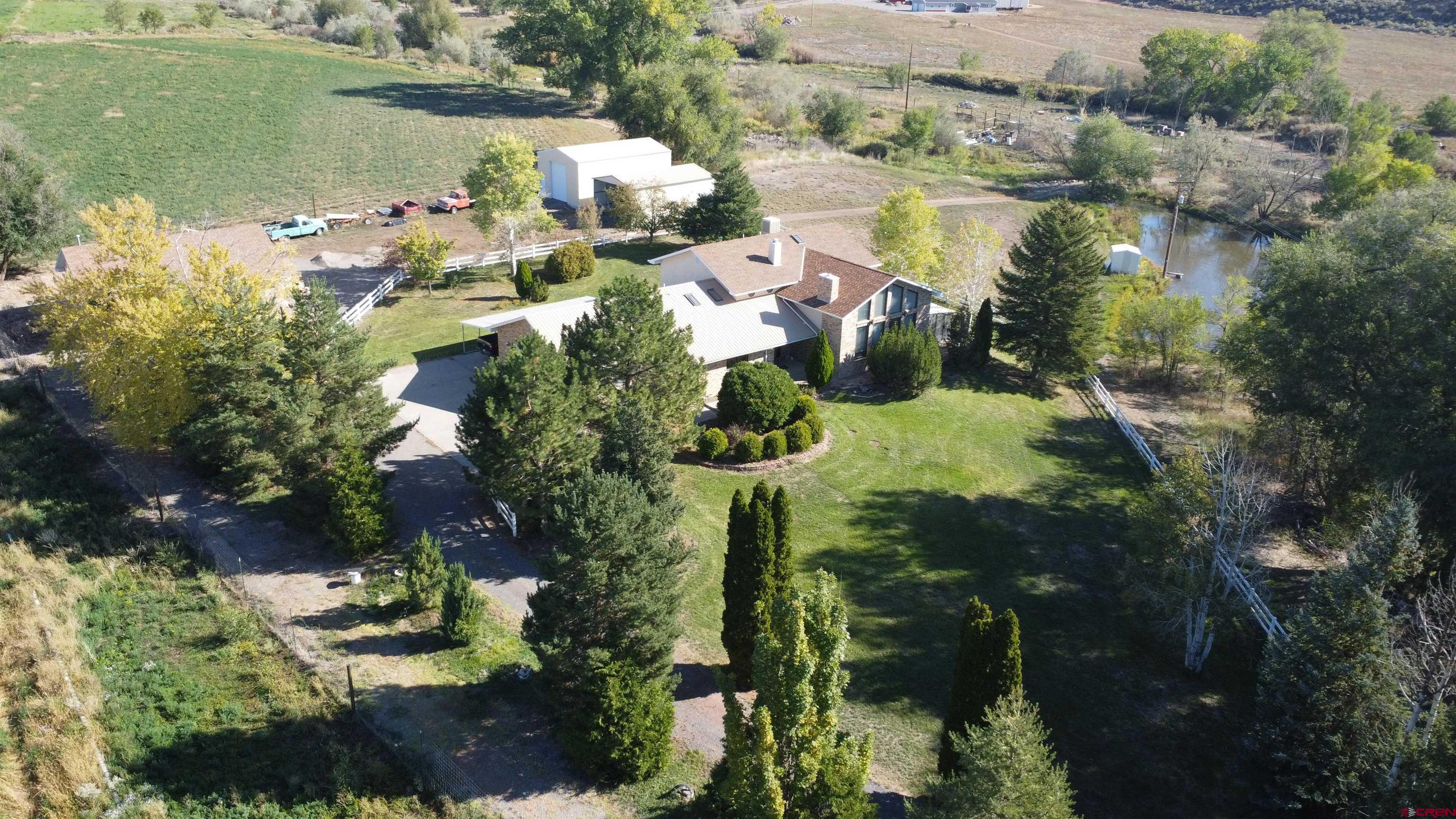 21855 Newland Road Eckert, CO 81418 - Photo 13 of 13 an aerial view of lake houses with outdoor seating