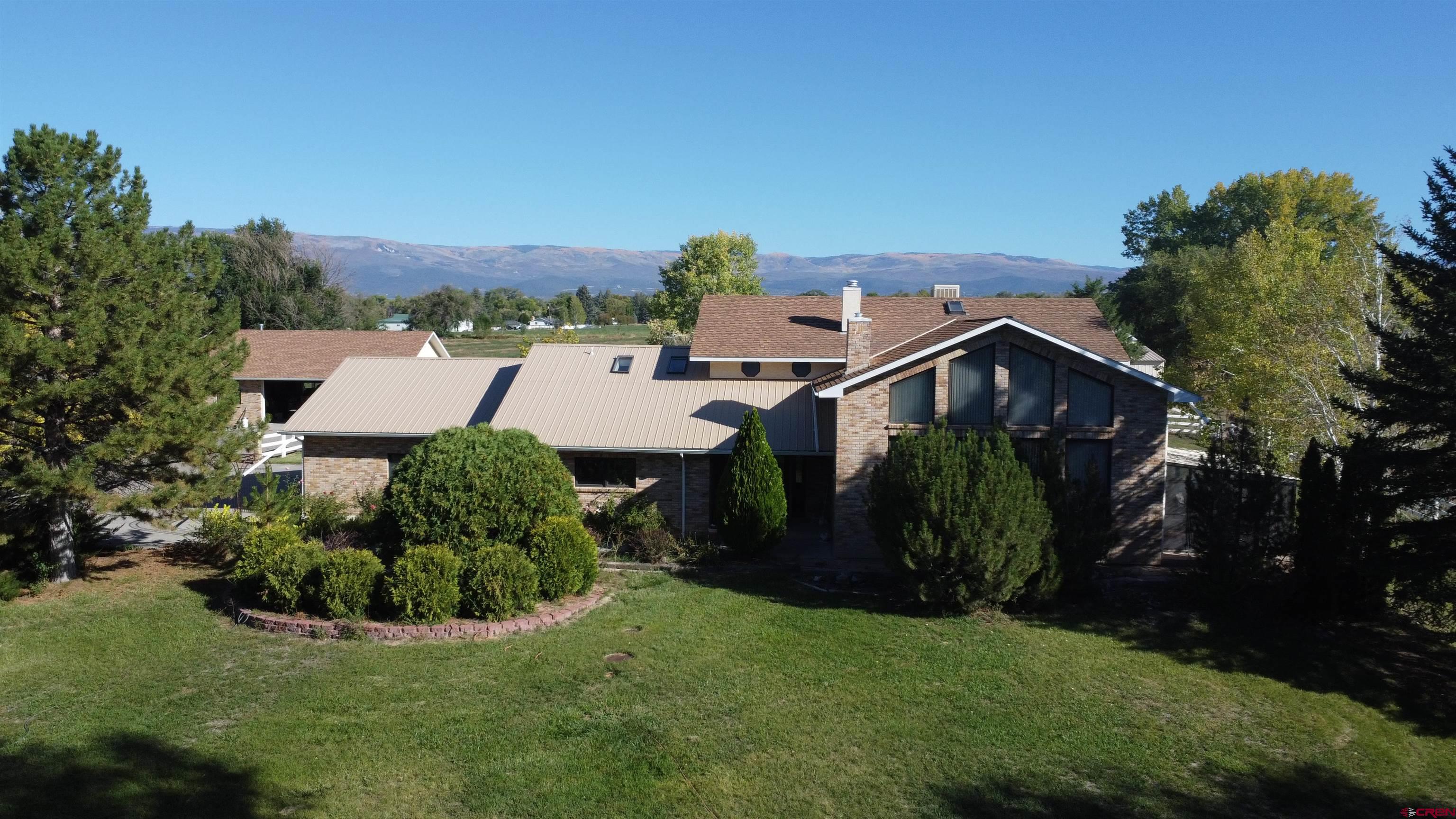 21855 Newland Road Eckert, CO 81418 - Photo 2 of 13 an aerial view of a house