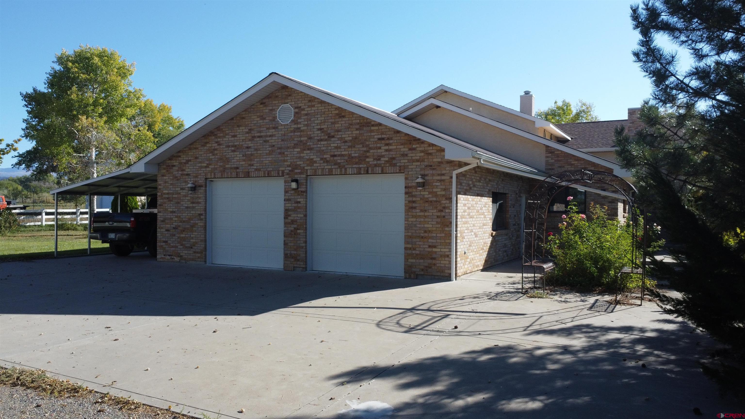 21855 Newland Road Eckert, CO 81418 - Photo 3 of 13 a view of a house with a yard