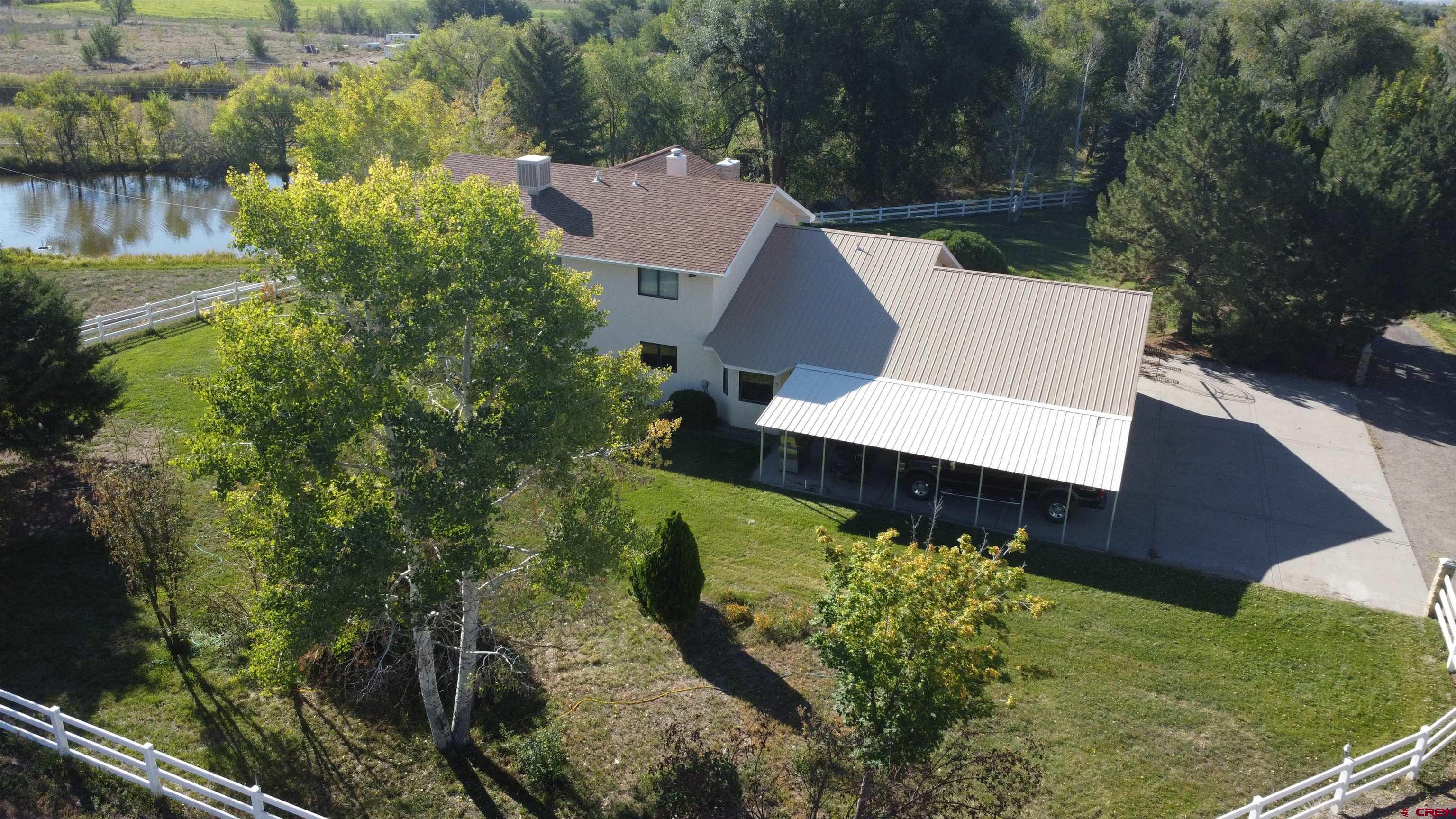 21855 Newland Road Eckert, CO 81418 - Photo 7 of 13 an aerial view of a house with a yard