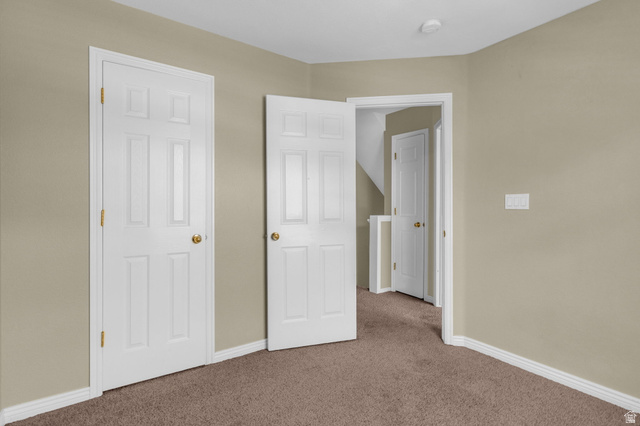14108 Pepi Band Road Draper, UT 84020 - Photo 23 of 36 Carpeted room with neutral wall color and white trim