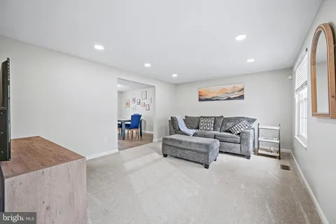 a living room with furniture and a couch