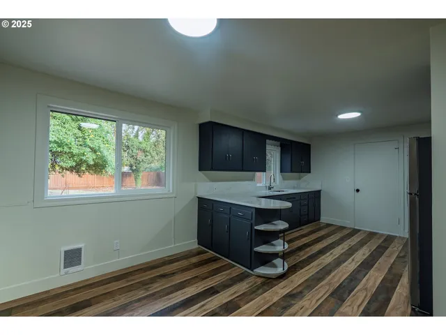 a room with furniture and window