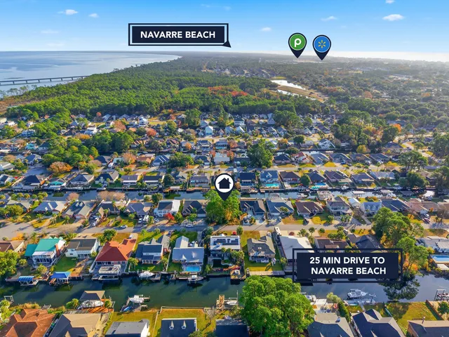 a view of swimming pool with outdoor seating