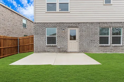 a view of outdoor space yard and front view of house