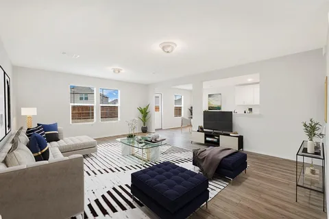 a living room with furniture or couch and a flat screen tv