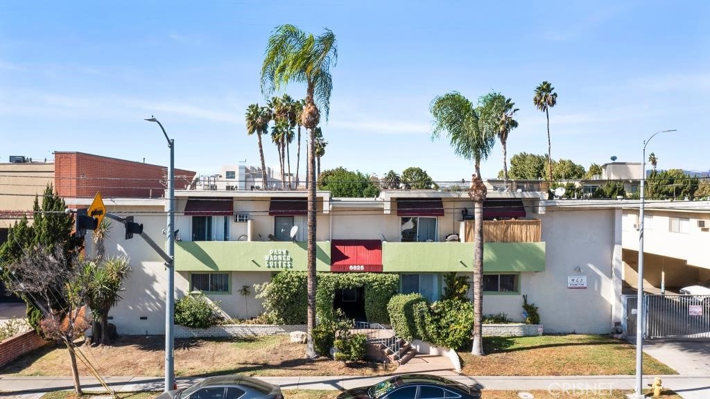 6825 De Soto Avenue Canoga Park, CA 91303 - Photo 1 of 21 a view of a lake with palm trees