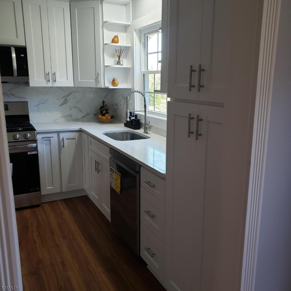 42 Stonewyck Road Chatham, NJ 07928 - Photo 32 of 35 a kitchen with cabinets and window