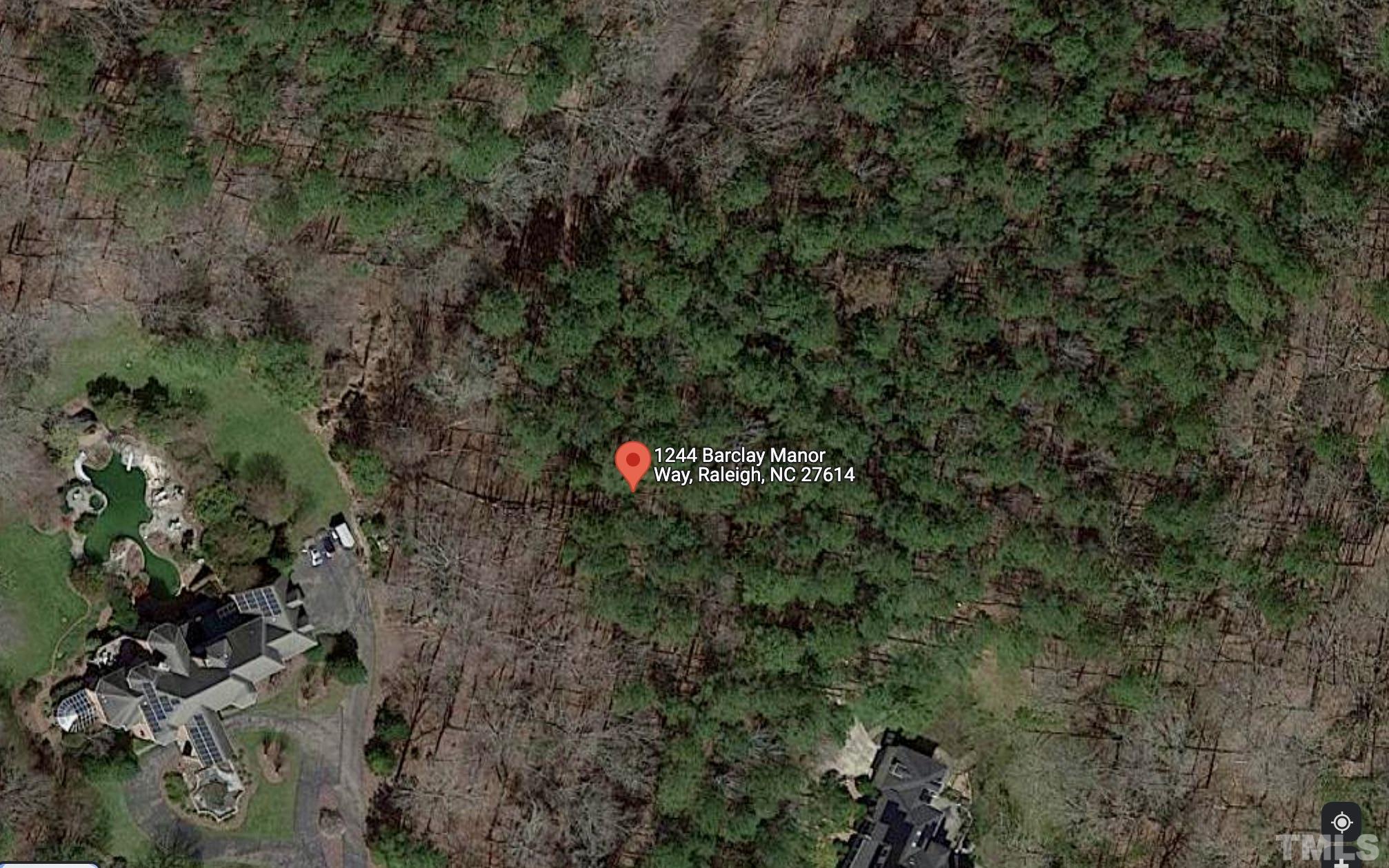 1244 Barclay Manor Way Raleigh, NC 27614 - Photo 2 of 4 a view of a forest with a tree