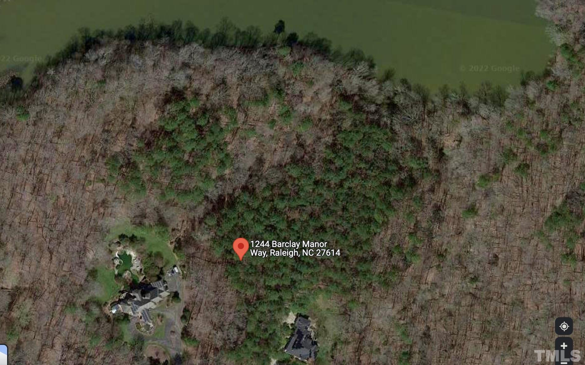 1244 Barclay Manor Way Raleigh, NC 27614 - Photo 3 of 4 a backyard of a house with lots of green space