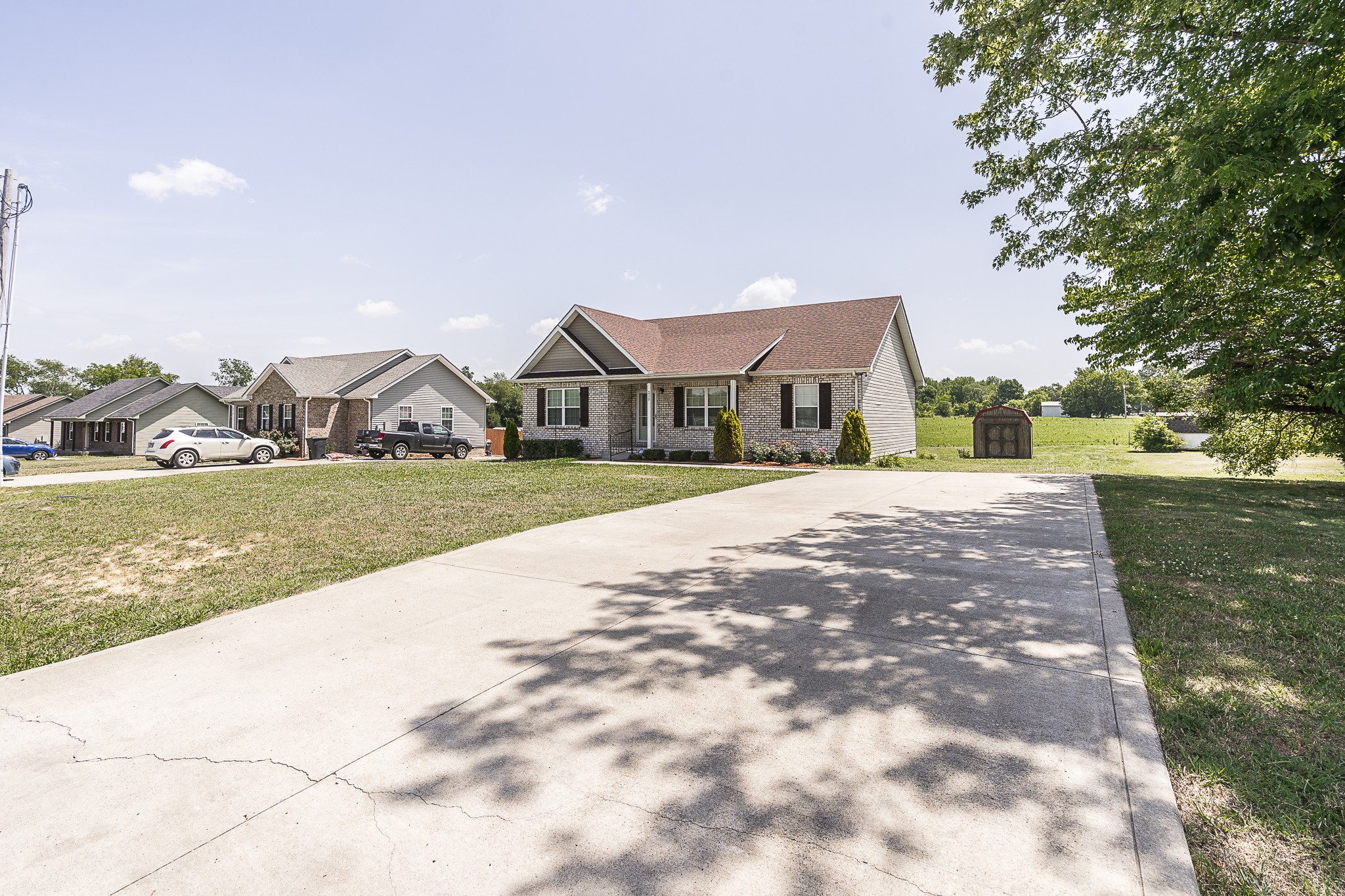 212 Scattersville Road Portland, TN 37148 - Photo 3 of 63 a front view of a house with a yard