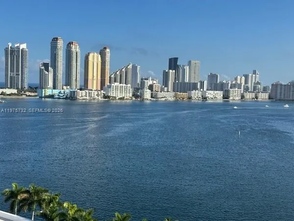 a view of a city with tall buildings