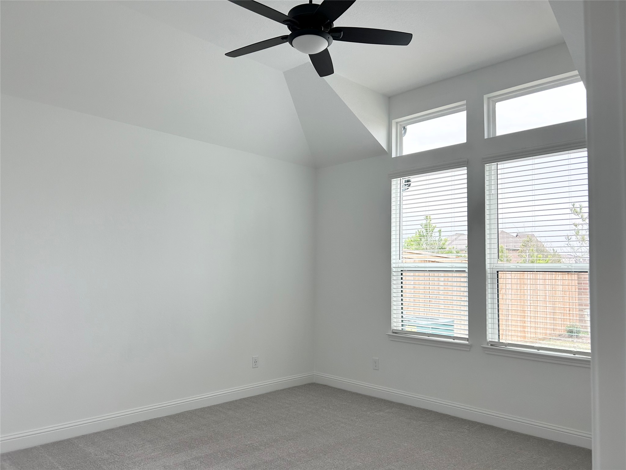 15310 Spanish Ranchos Way, Unit WAYS Cypress, TX 77433 - Photo 18 of 40 Primary bedroom with a ceiling fan and tons of natural light