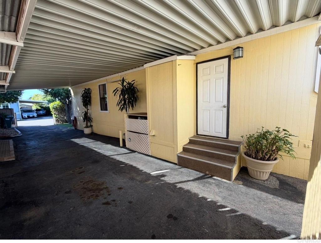 1455 Alturas Road, Unit 89 Fallbrook, CA 92028 - Photo 11 of 14 a porch with seating space