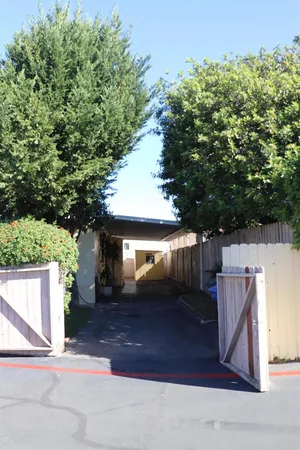 a view of backyard with green space