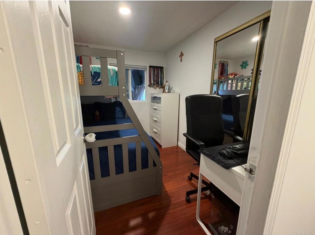 1455 Alturas Road, Unit 89 Fallbrook, CA 92028 - Photo 7 of 14 a view of a workspace with furniture and a gate