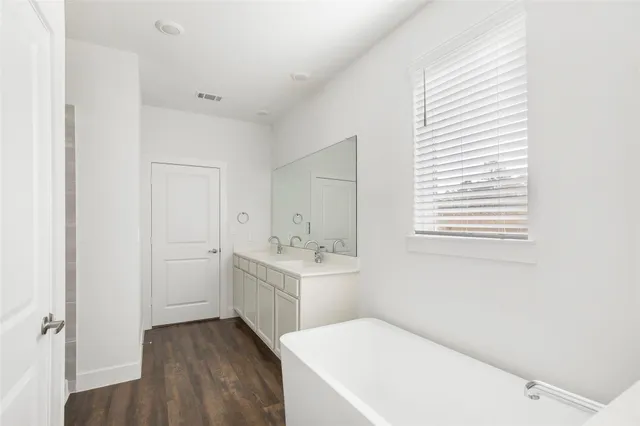 a bathroom with a sink and a bathtub