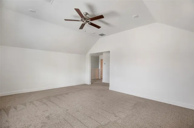 a view of a big room with carpet