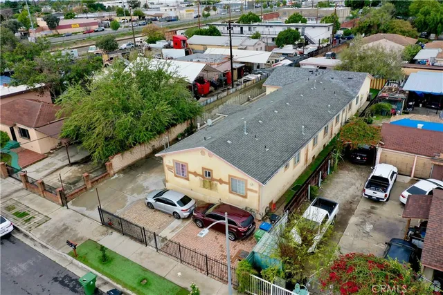 an aerial view of a house with a garden