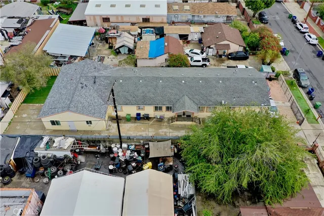 an aerial view of a house with a garden