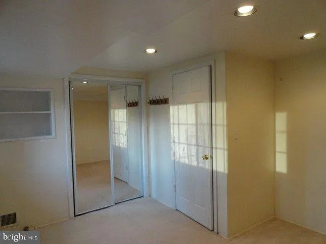 a view of elevator with hallway