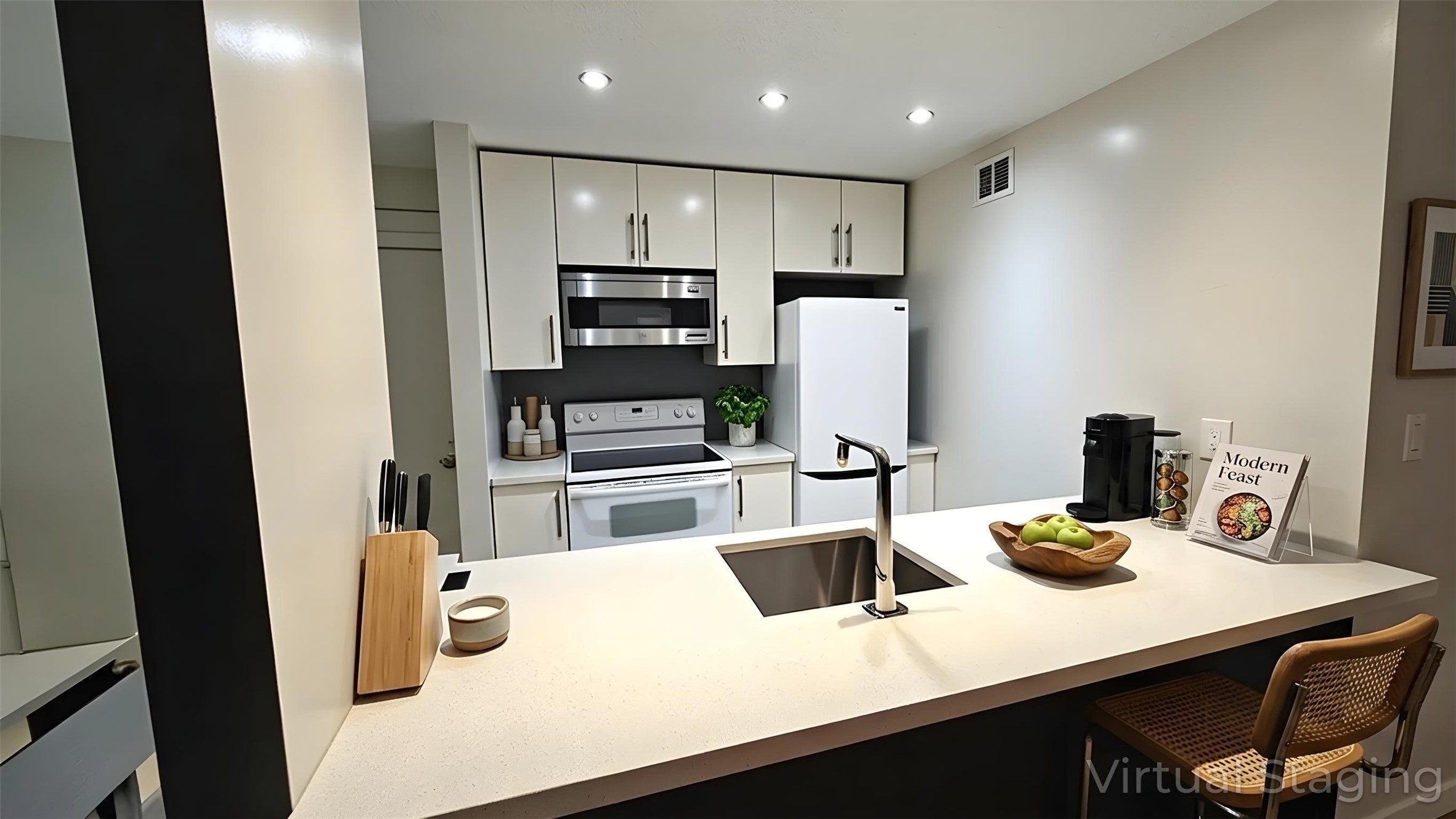 6601 Sands Point Drive, Unit 34 Houston, TX 77074 - Photo 5 of 24 a kitchen with kitchen island a sink appliances and cabinets