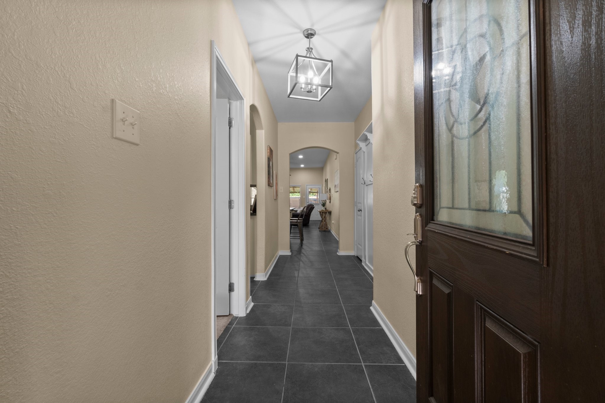 28987 Birch Green Way Spring, TX 77386 - Photo 8 of 32 a view of a hallway view with wooden floor and staircase