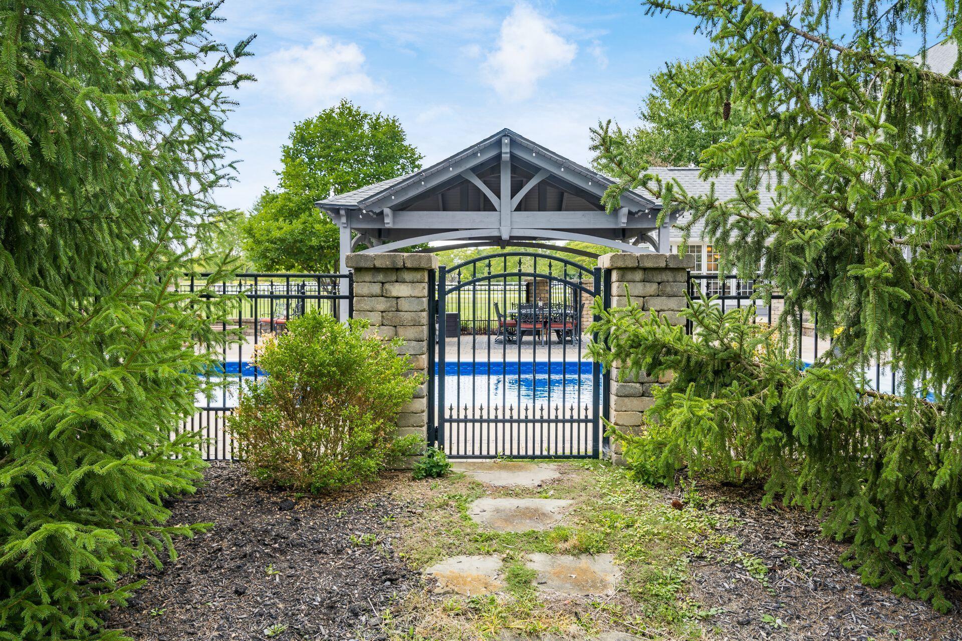 7555 Cook Road Powell, OH 43065 - Photo 47 of 65 Side gate to the pool