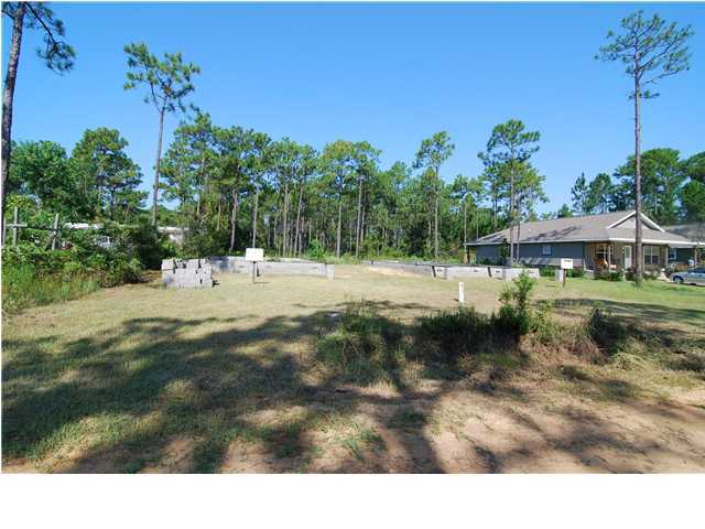 Lot 4 3rd Street Santa Rosa Beach, FL 32459 - Photo 5 of 6 a view of a lake with houses