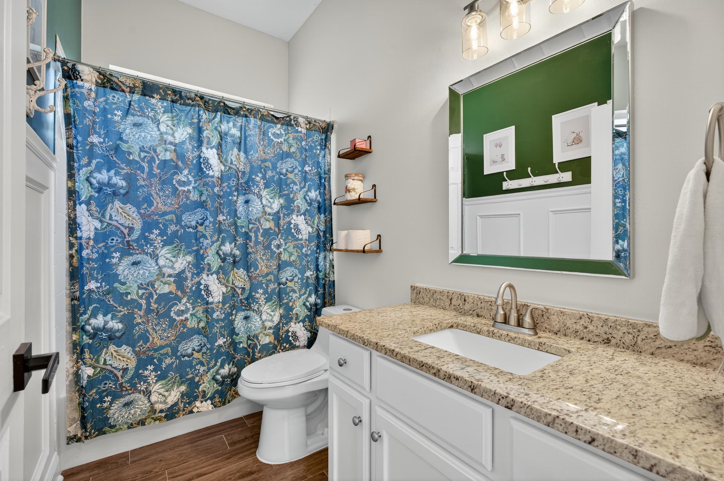 641 Pelham Road St. Augustine, FL 32092 - Photo 33 of 62 a bathroom with a granite countertop sink toilet and shower
