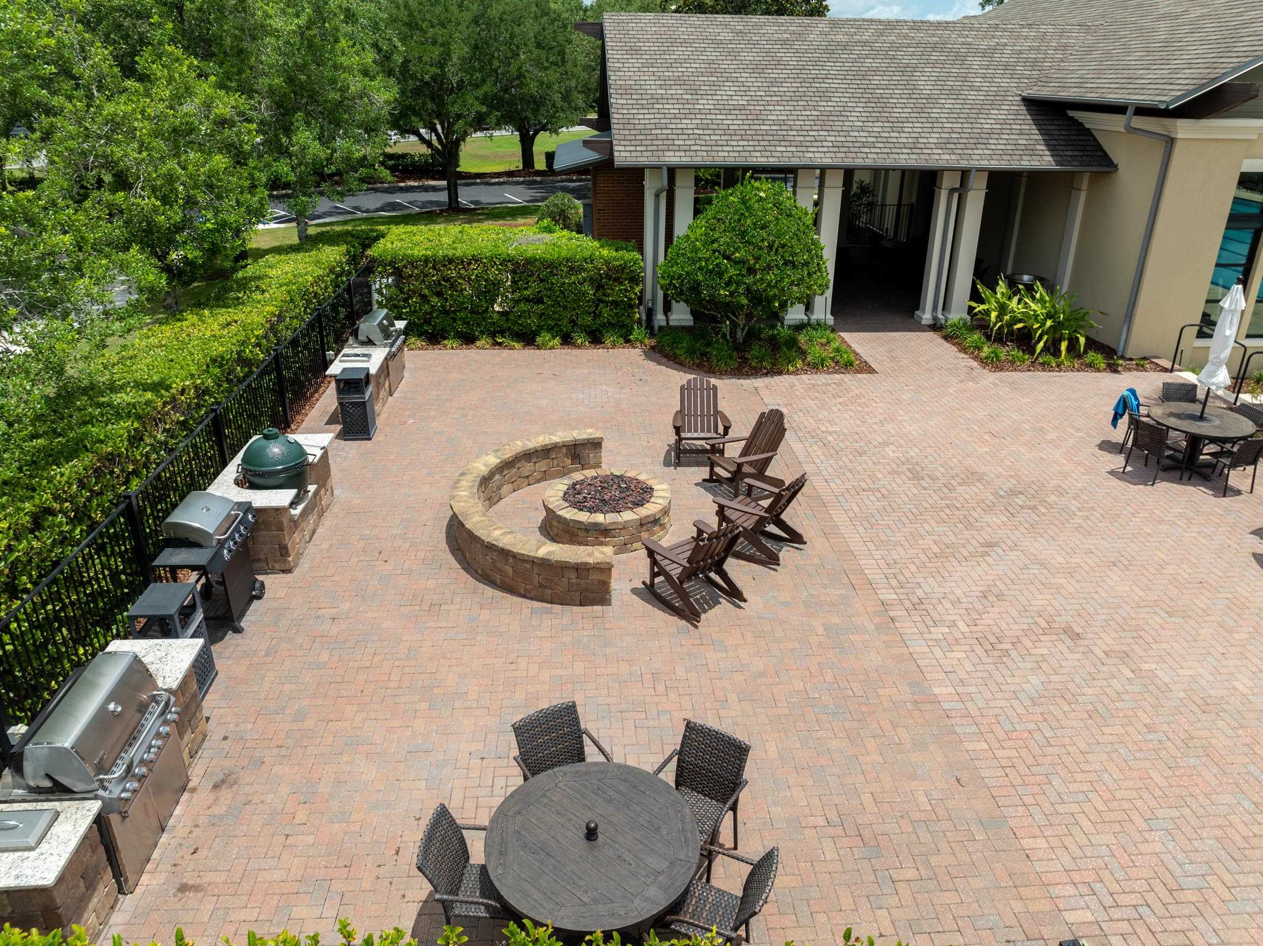 641 Pelham Road St. Augustine, FL 32092 - Photo 56 of 62 a view of a backyard with plants and a patio