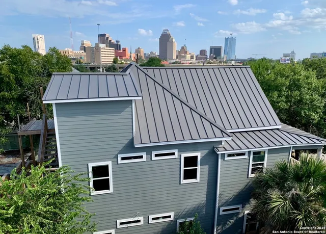 a view of a house with a roof deck