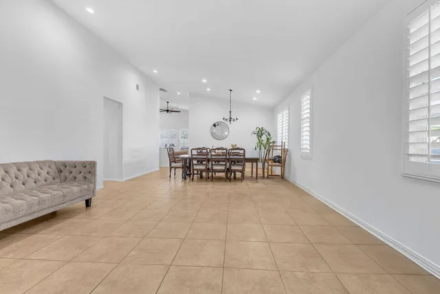 a room with furniture and a piano