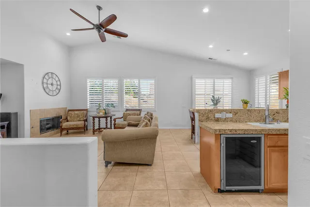 a kitchen with stainless steel appliances granite countertop a stove and a sink