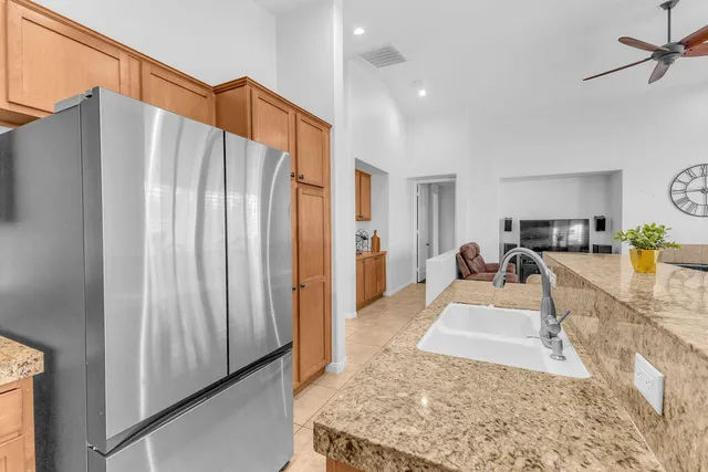 a view of a living room and a kitchen