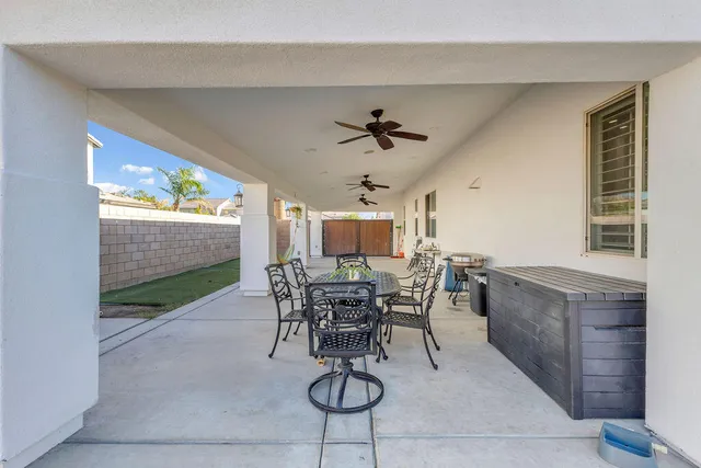 a view of a livingroom with furniture and a flat screen tv