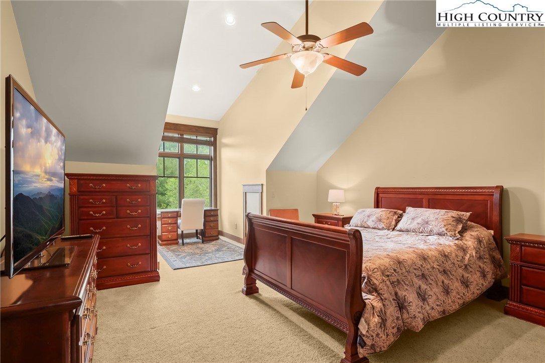 138 South Camp Road, Unit 103 Boone, NC 28607 - Photo 48 of 50 a bed room with a bed and a television