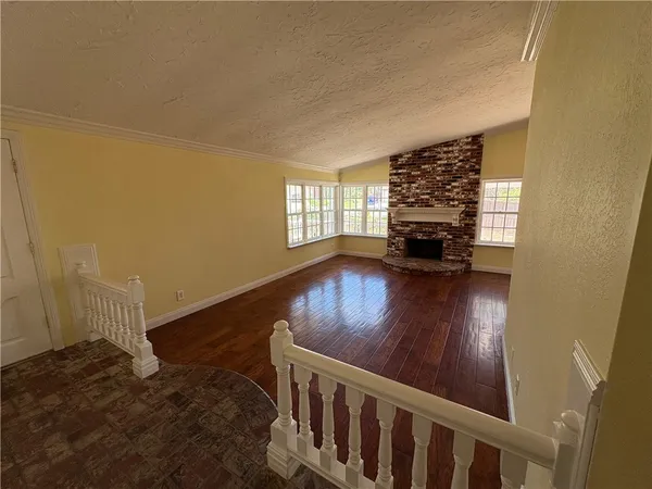 a view of a balcony with a swimming pool