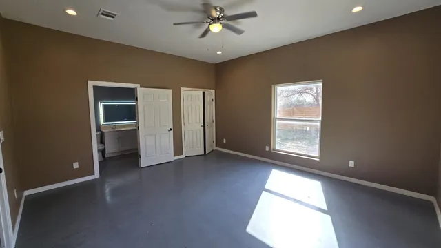 a bathroom with a sink a toilet and a shower