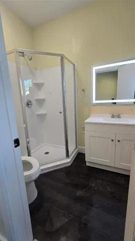 a view of the patio with a yard