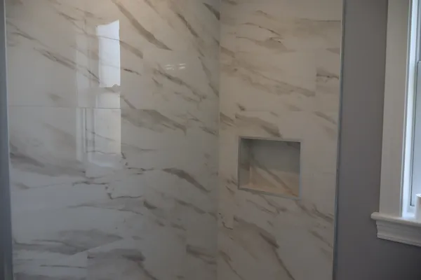 a bathroom with a white bath tub